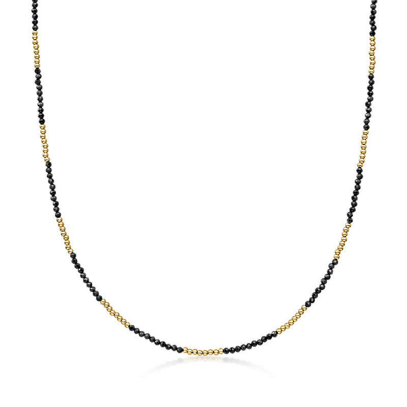 Black spinel bead necklace with tiny 10kt yellow gold spacer beads, full strand