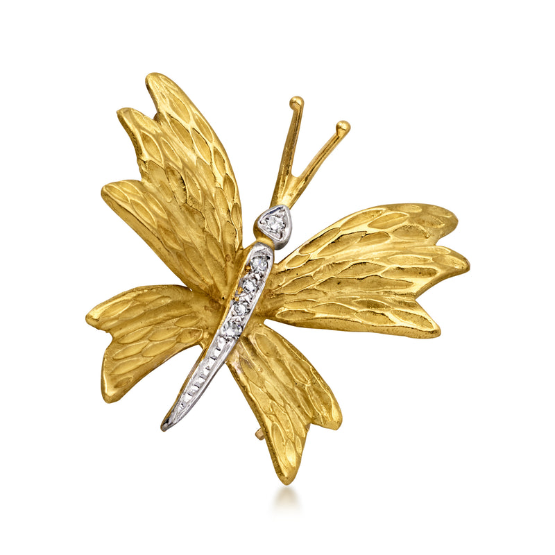 Vintage two-tone gold butterfly pin with diamond accents, gold wings