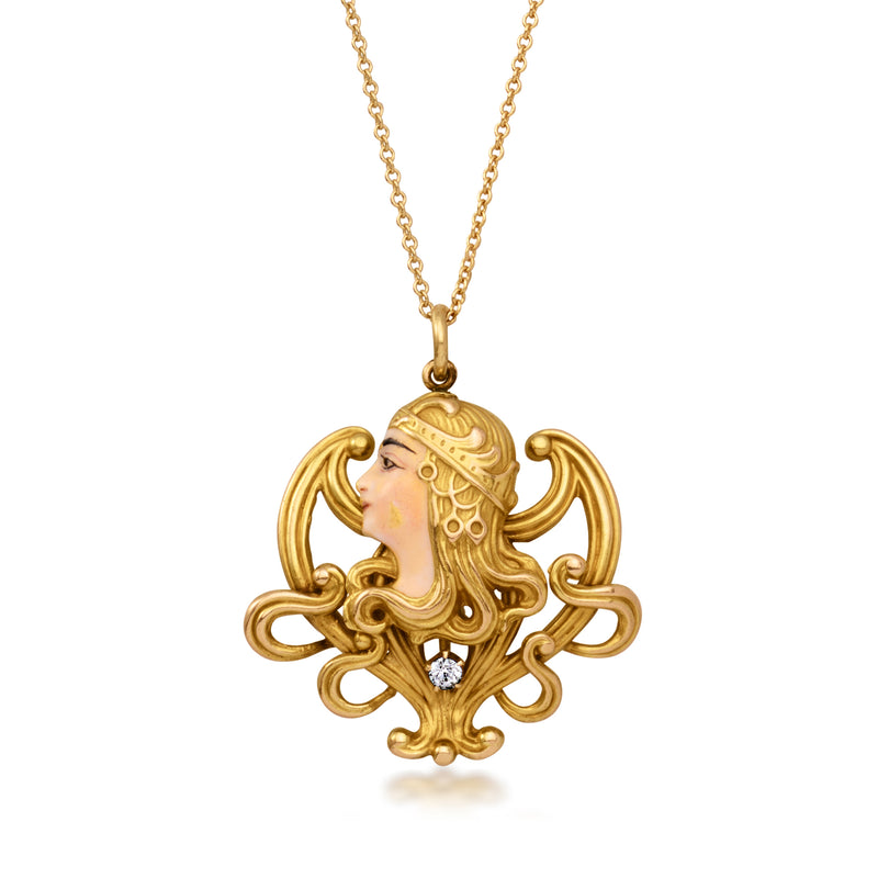 14kt yellow gold pendant necklace with ornate woman profile charm and diamond