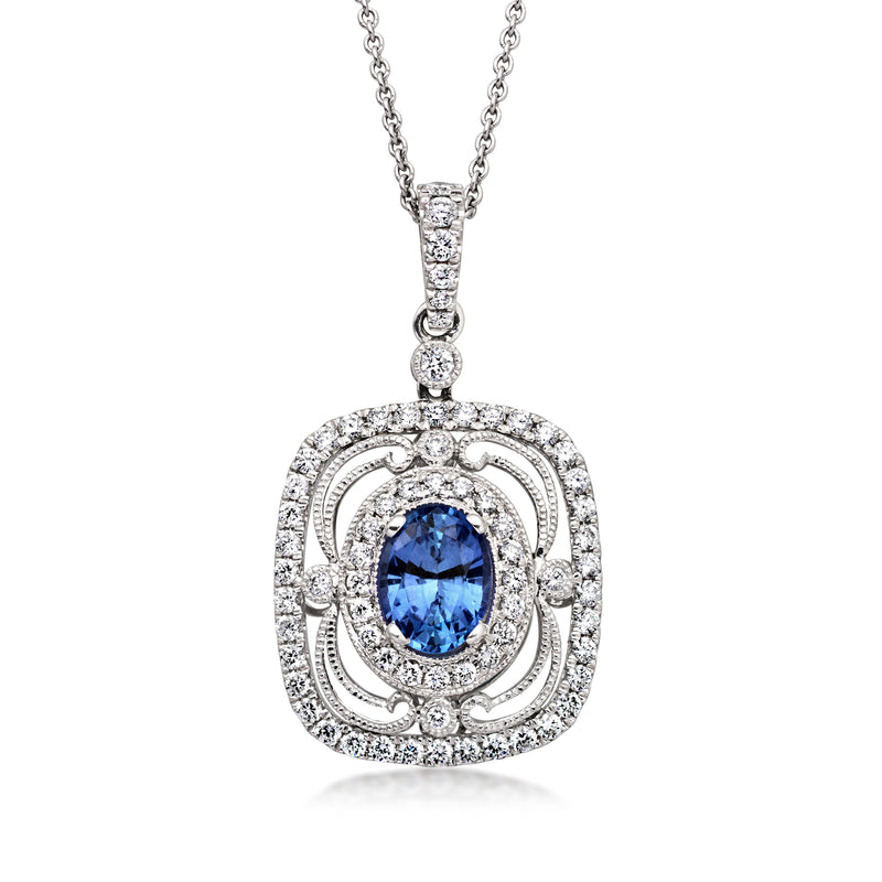 Diamond halo sapphire pendant necklace in 14k white gold with oval blue center stone