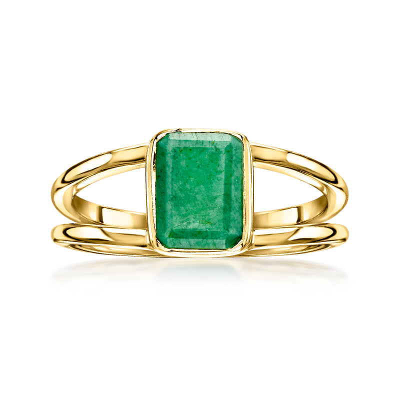 Gold-tone ring with rectangular emerald-green gemstone and slim openwork band