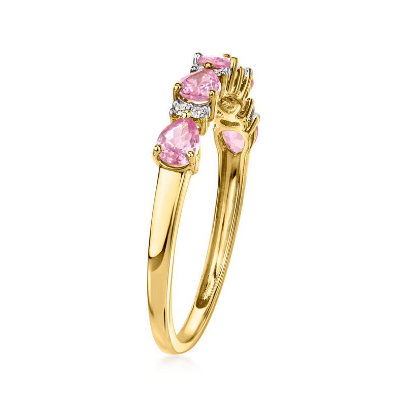 14kt yellow gold ring with five pink oval sapphires and diamond side stones