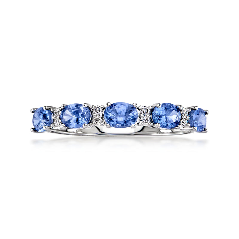 14kt white gold sapphire and diamond band ring with five oval blue stones