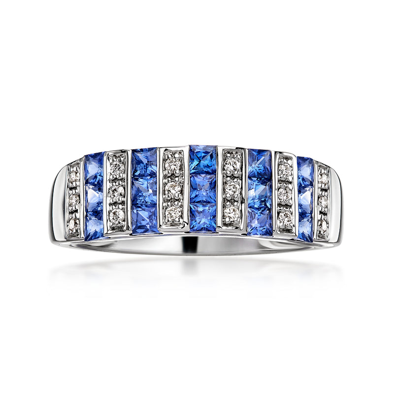 White gold ring with blue sapphire baguettes and diamond accents