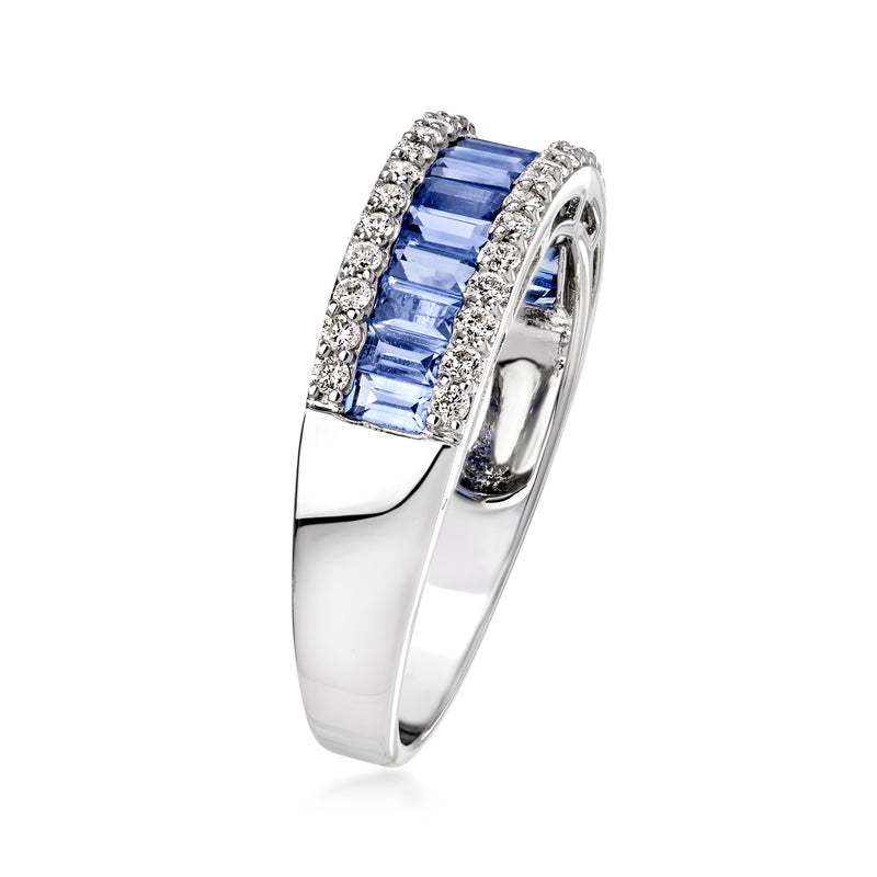 White gold sapphire and diamond ring with blue baguette centerpiece in prongs
