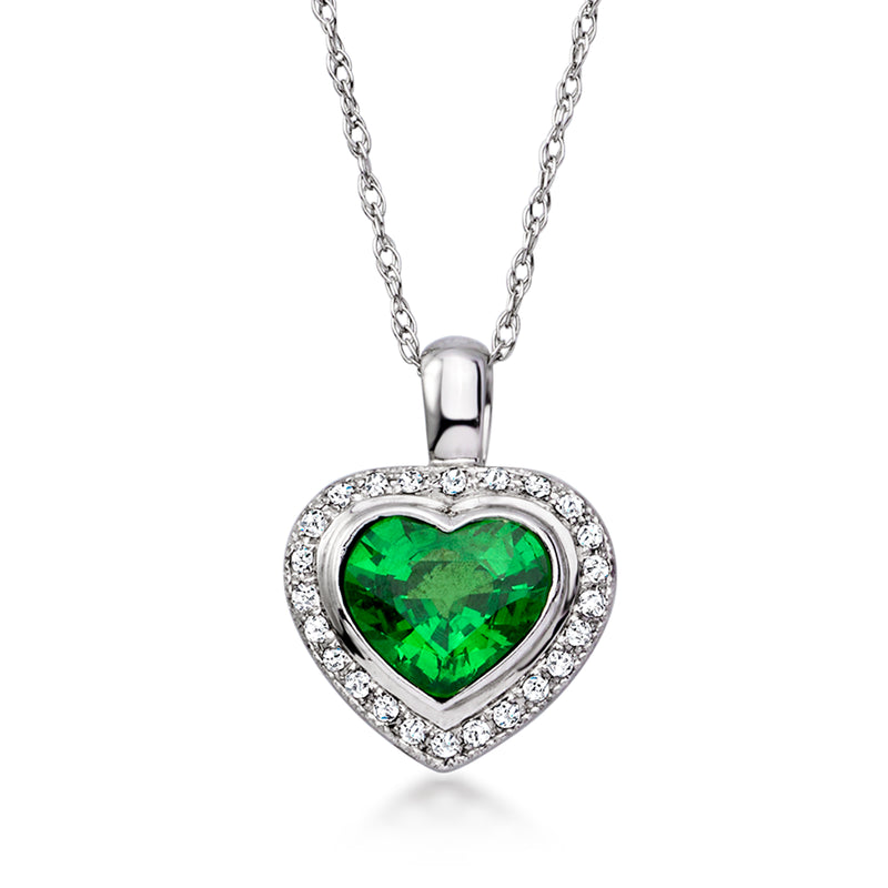 Heart pendant necklace in white gold with green gemstone center and diamond halo