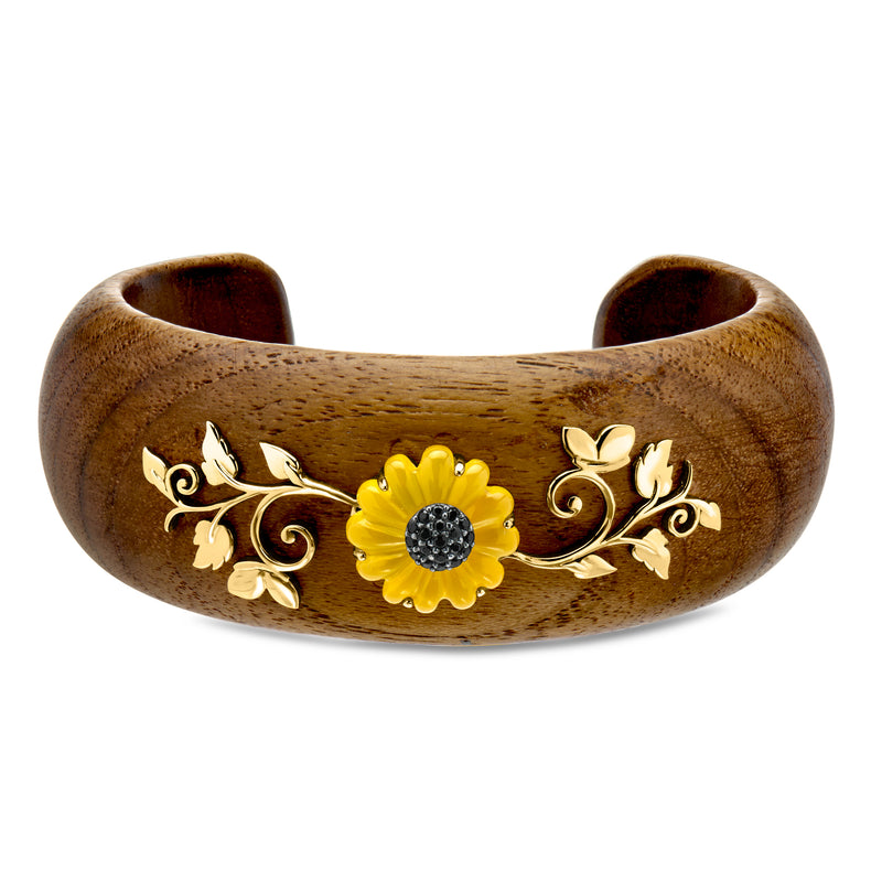 Sunflower cuff bracelet with brown wooden-style band and gold floral detailing, yellow flower center