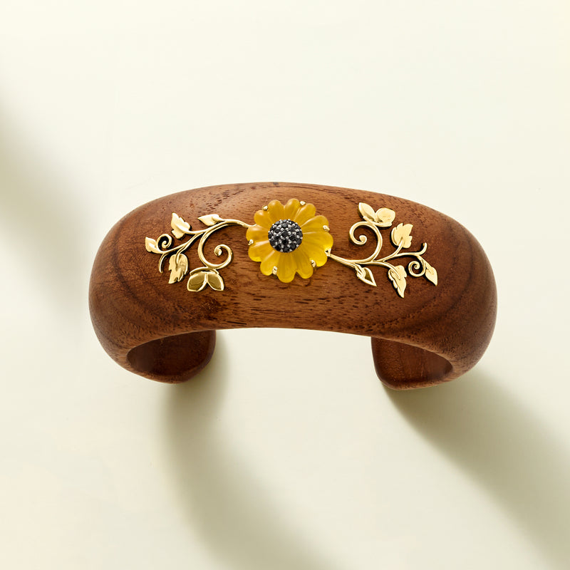Sunflower cuff bracelet with brown wooden-style cuff, gold filigree, yellow flower with dark center