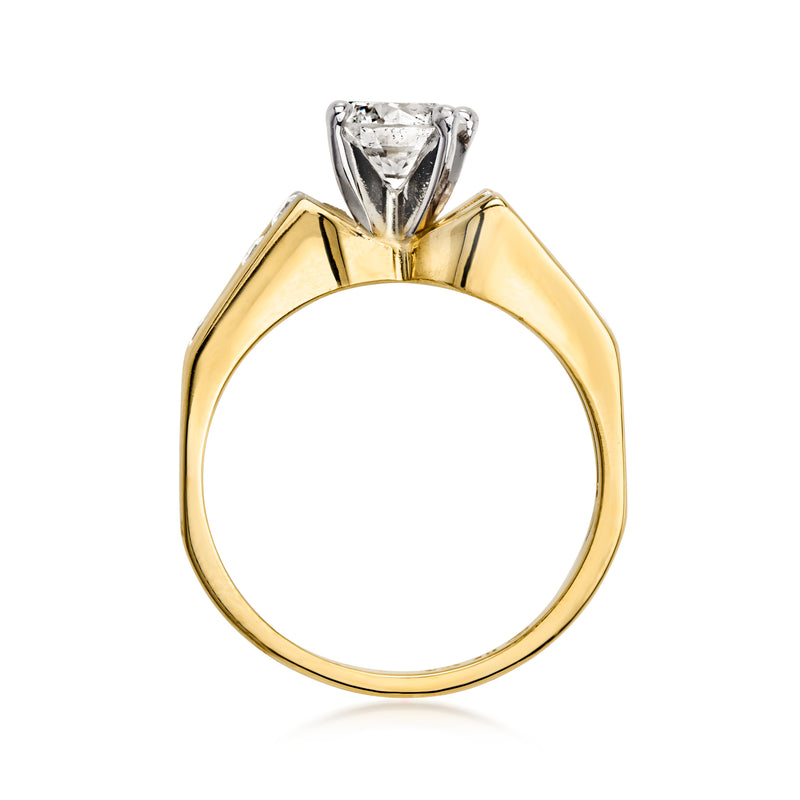 Yellow gold diamond ring with round center stone and open split-shank setting