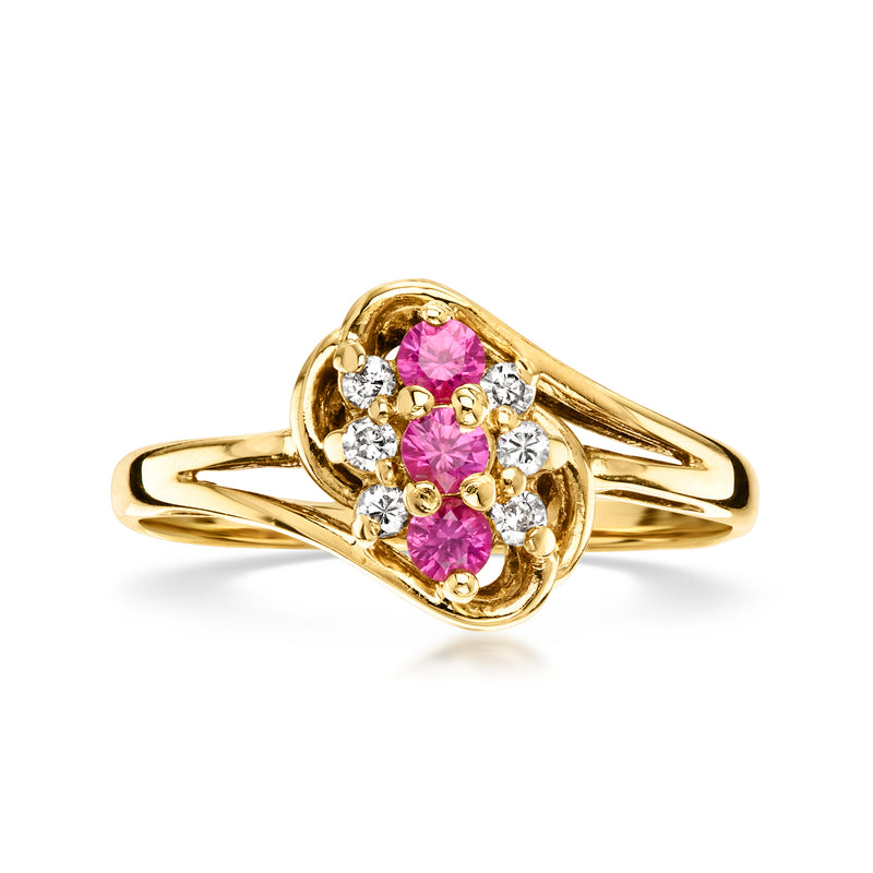 14kt yellow gold vintage ring with oval pink ruby center and diamond accents