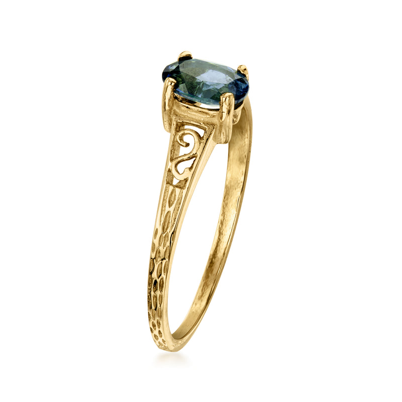 14kt yellow gold ring with London blue topaz, raised prong-set oval gemstone, side view