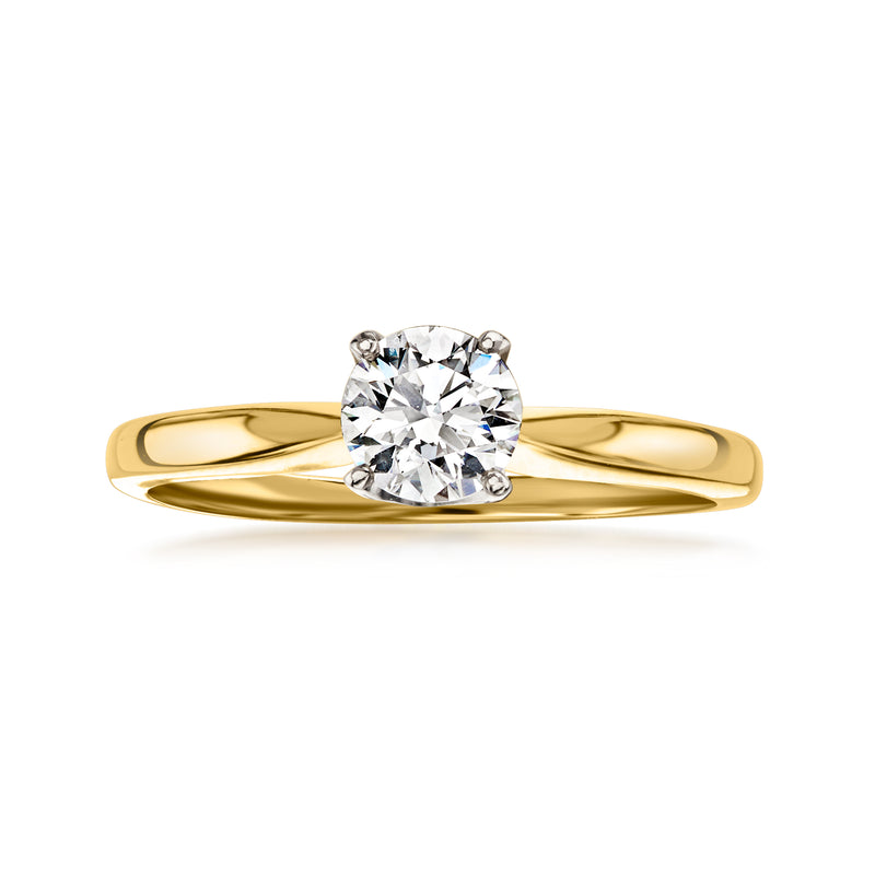 Vintage 18k yellow gold diamond ring with a round center stone, prong-set.