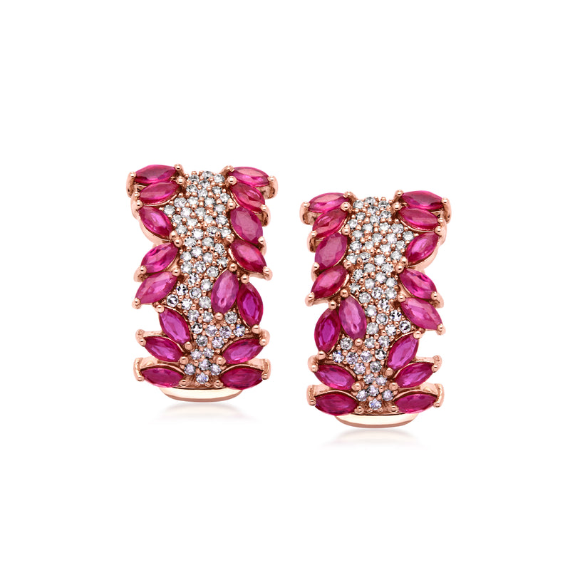 Rose gold ruby and diamond cluster hoop earrings with curved fan design and pink stones.