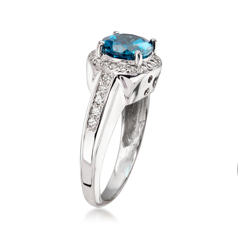Vintage 14kt white gold ring with oval London blue topaz and diamond accents