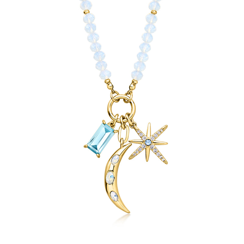 Gold-plated celestial charm necklace with blue moon, star, and simulated gemstones