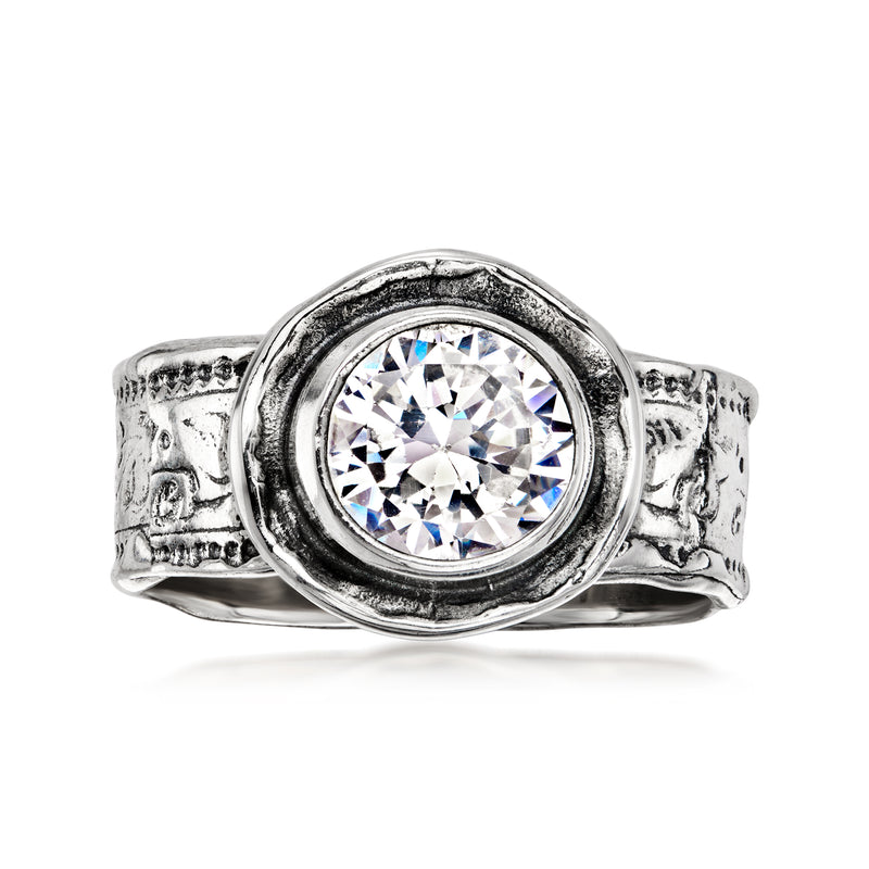 Sterling silver vintage ring with round CZ center and ornate halo bezel
