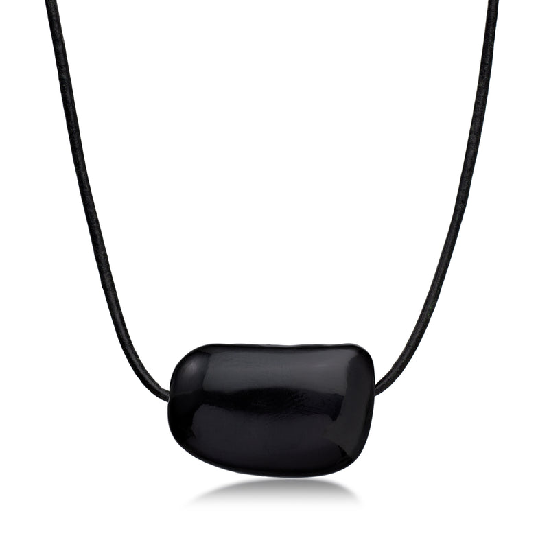 Black bead pendant necklace on adjustable black leather cord, rounded glossy stone.