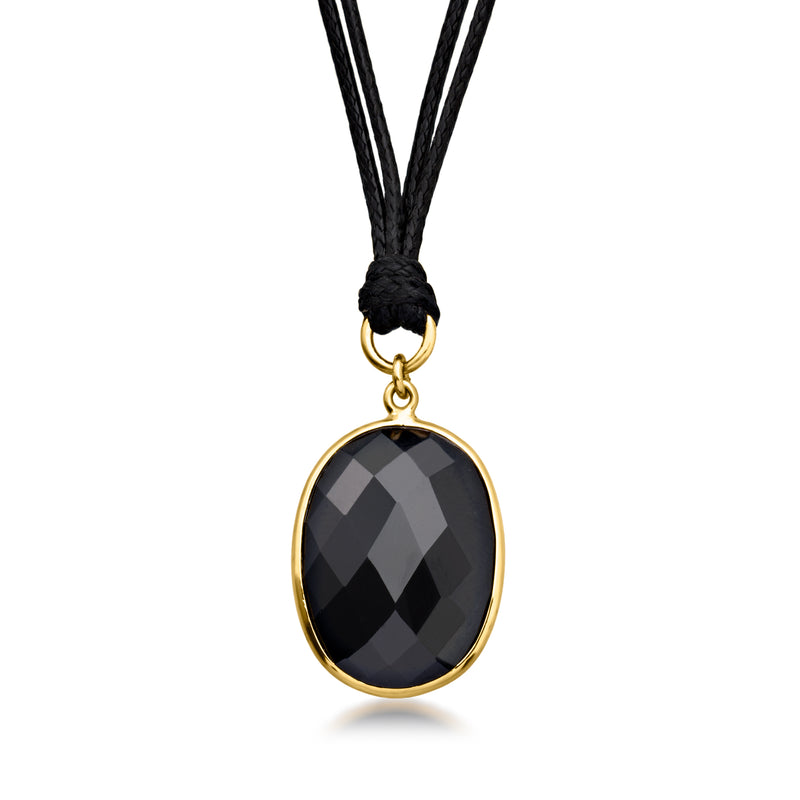 Oval onyx pendant necklace with black vegan leather cord and gold-tone bail