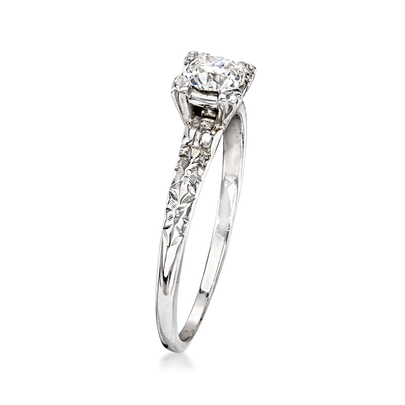 18kt white gold solitaire diamond ring, side view with four-prong center setting