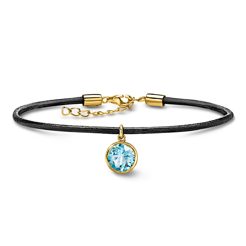 Black leather cord bracelet with gold clasp and round blue topaz pendant