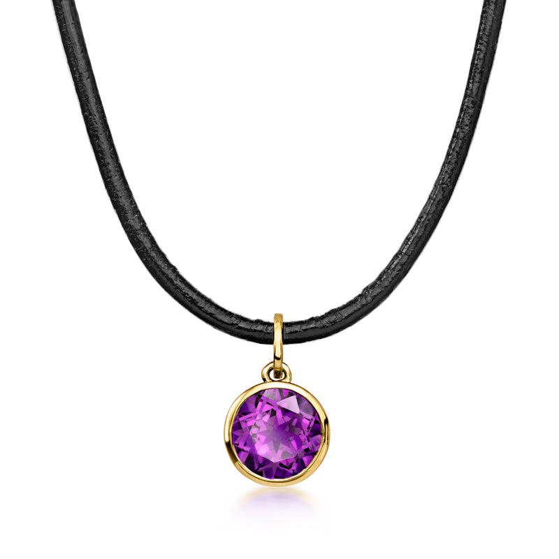 Amethyst pendant necklace on black leather cord with gold bezel, round purple stone