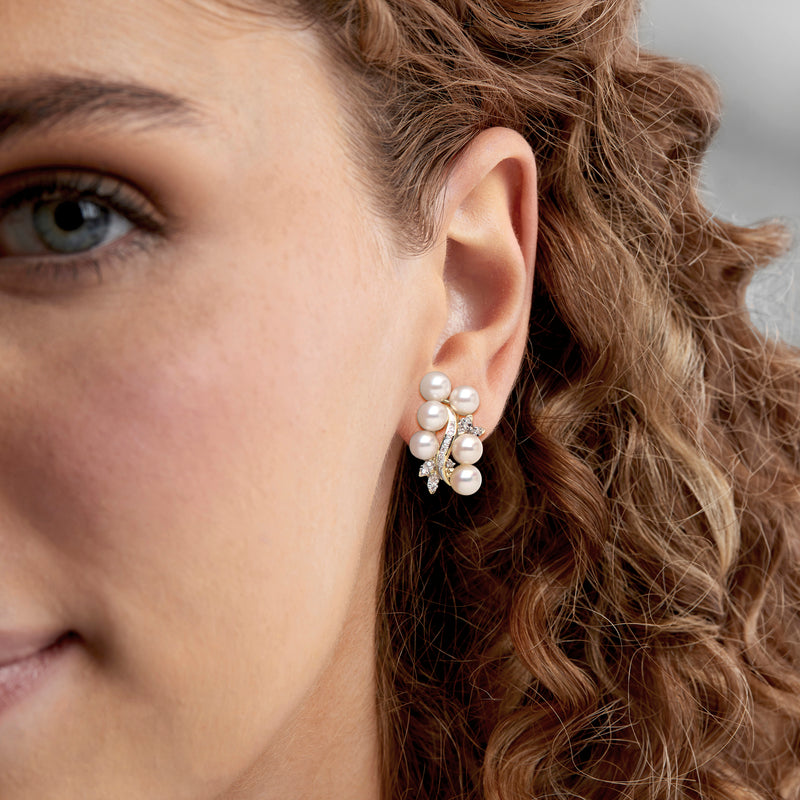 Cultured pearl cluster earrings on model, yellow gold with diamond accents