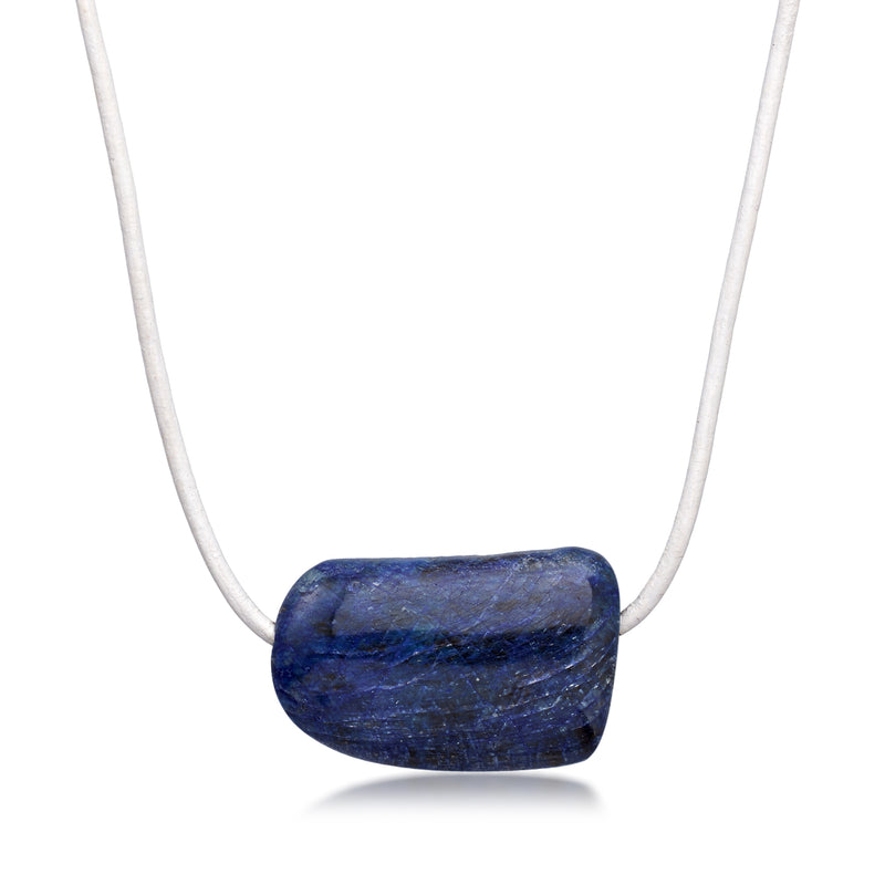 Sapphire blue bead necklace on white adjustable leather cord, elongated rectangular bead