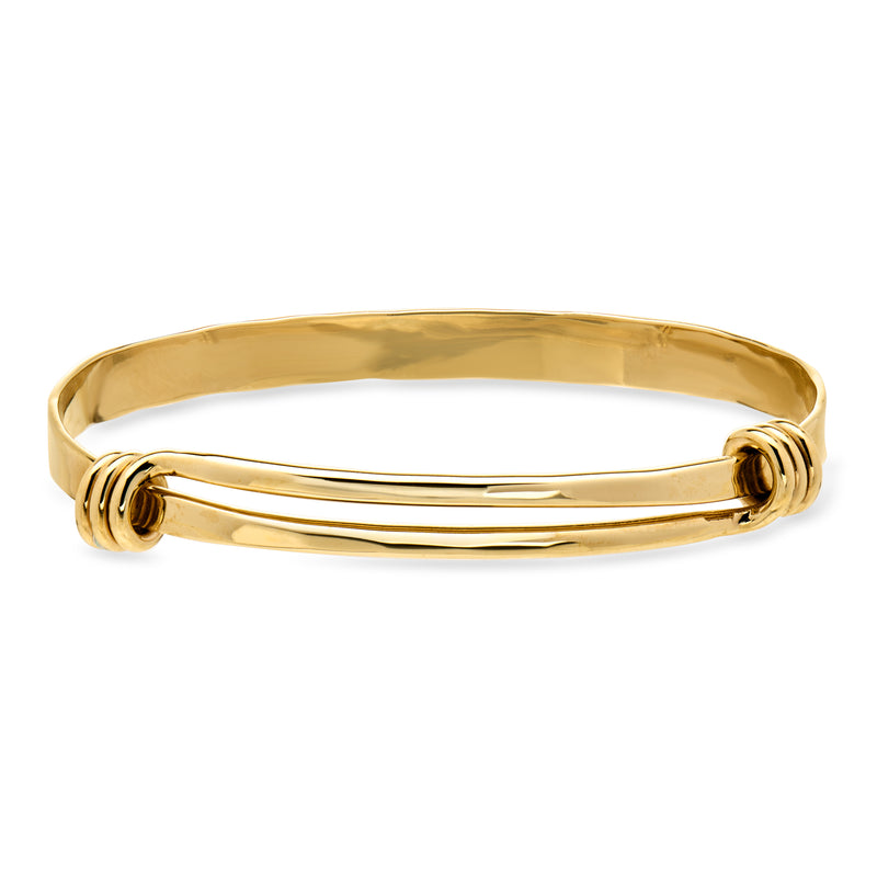 14kt yellow gold bangle bracelet with ridged clasp ends