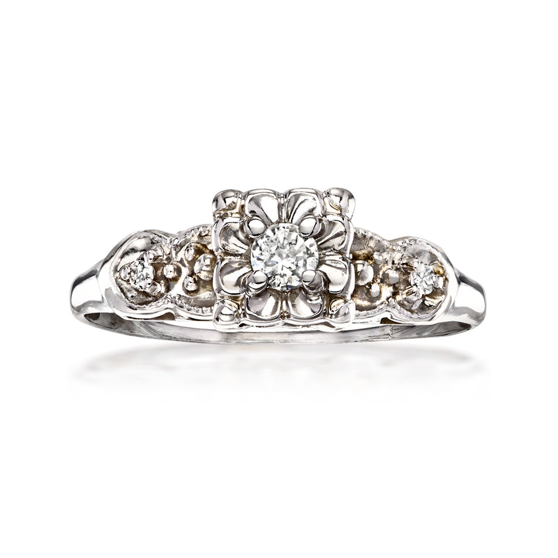 Vintage 14kt white gold diamond ring with round center stone and side clusters