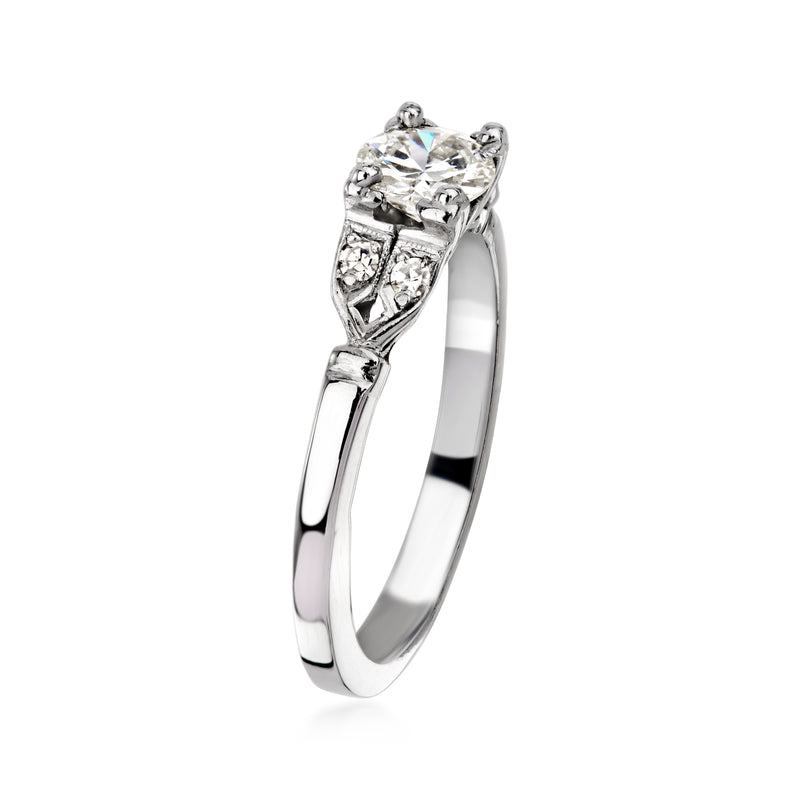 14kt white gold vintage diamond ring, oval center stone with prongs and split shank