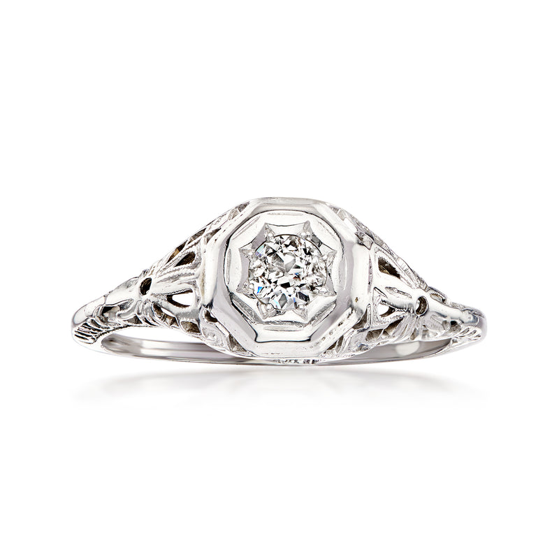 Vintage diamond filigree ring in white gold, round center stone, scrollwork shoulders