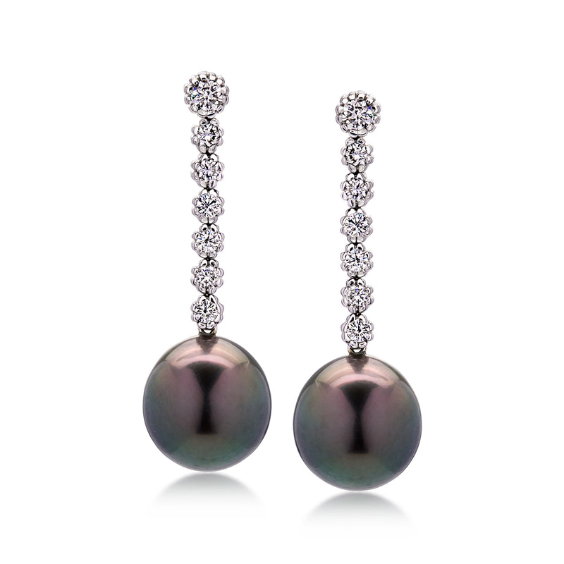 Black pearl drop earrings with diamond line clusters in white gold