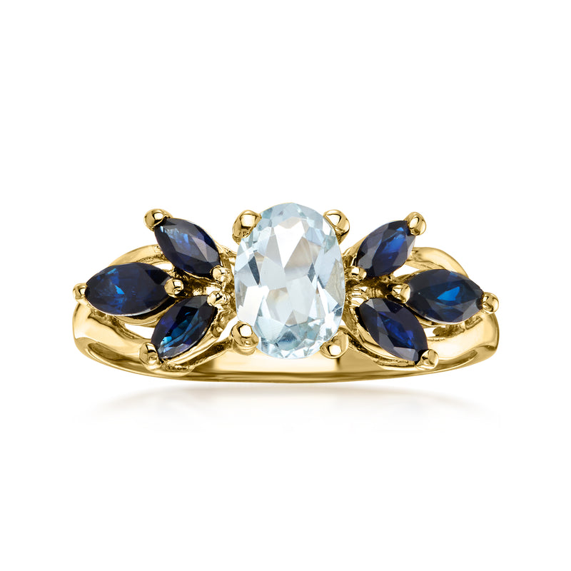 14kt yellow gold ring with oval aquamarine center and blue sapphire side stones