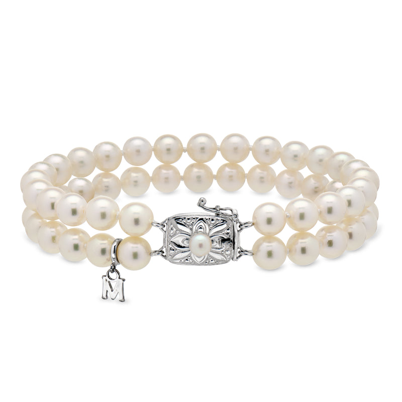 Cultured pearl two-strand bracelet with silver-tone square clasp and small M charm
