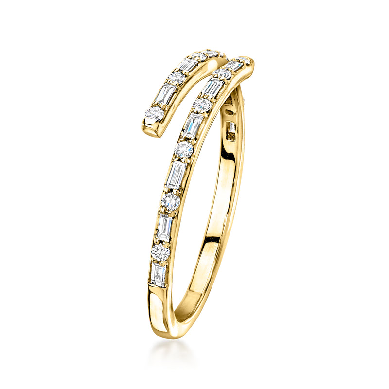 10kt yellow gold bypass ring, side view, baguette and round diamond detailing