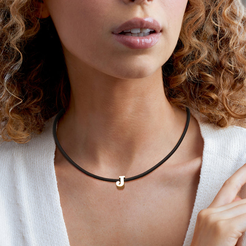 Gold over sterling initial J necklace on black leather cord