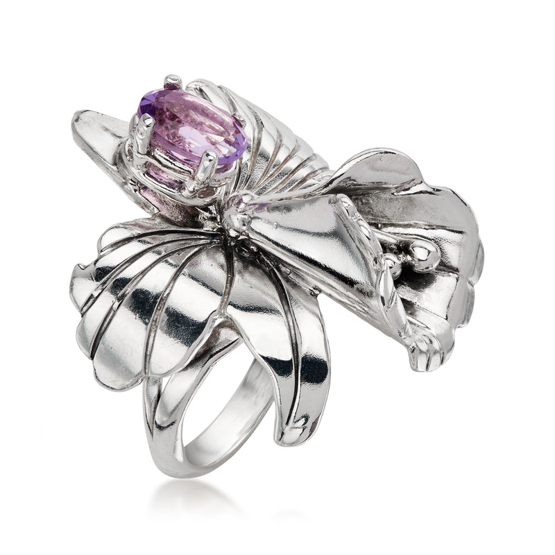 Sterling silver flower ring with purple amethyst gemstone and textured petal band