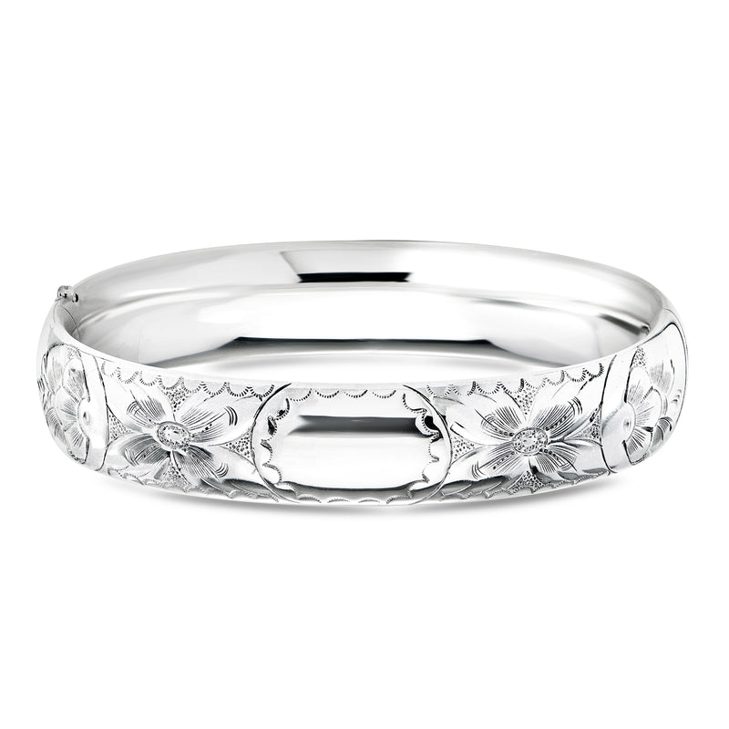 Vintage sterling silver bangle bracelet with floral engraving pattern