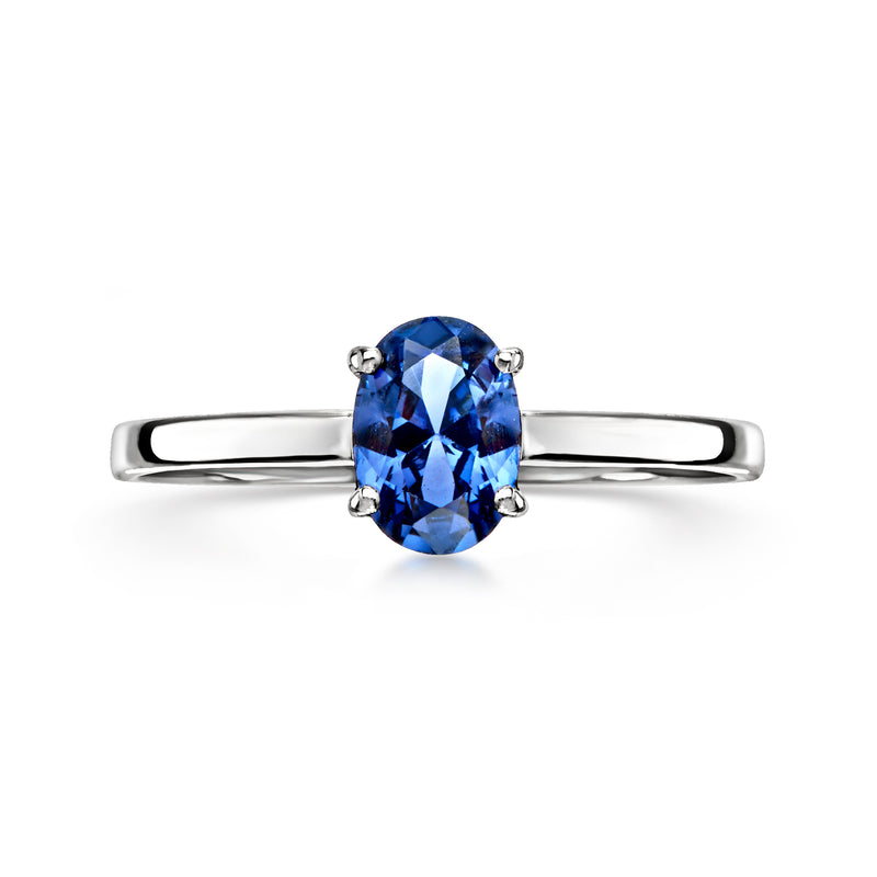 10kt white gold ring with oval blue sapphire and four-prong setting