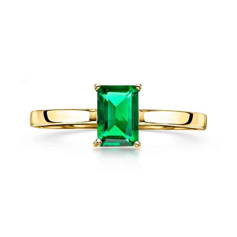 10kt yellow gold ring with emerald-cut green gemstone, four-prong setting