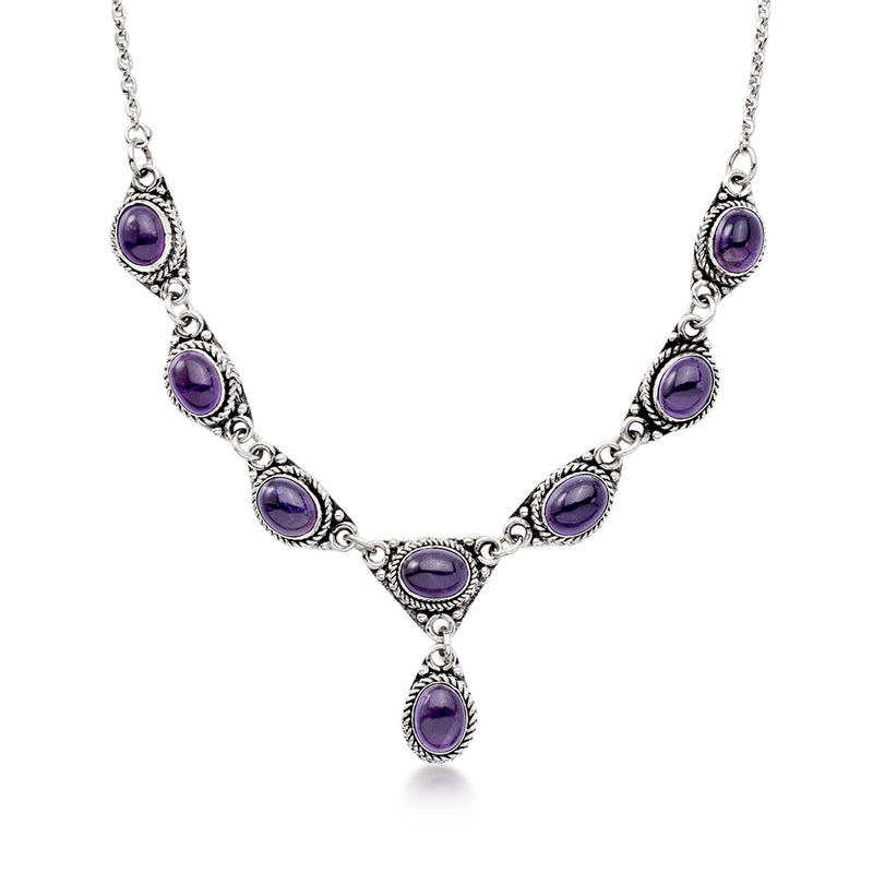 Sterling silver amethyst drop necklace with five oval purple gemstones, linked stations
