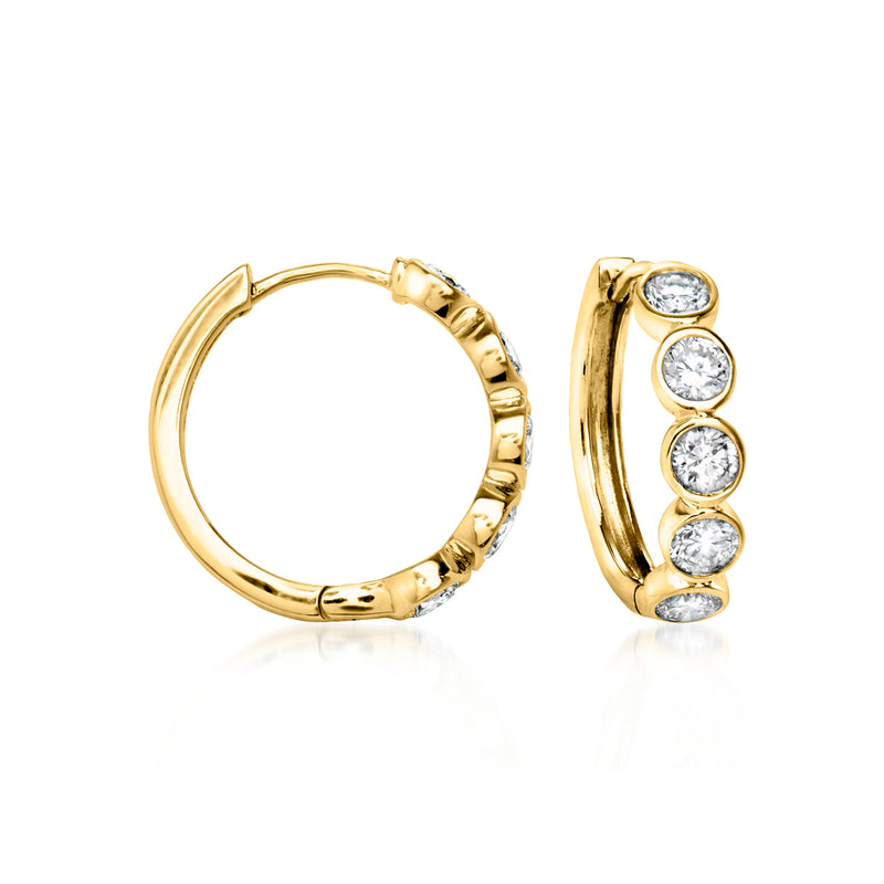 Gold hoop earrings with bezel-set round diamonds, hinged back