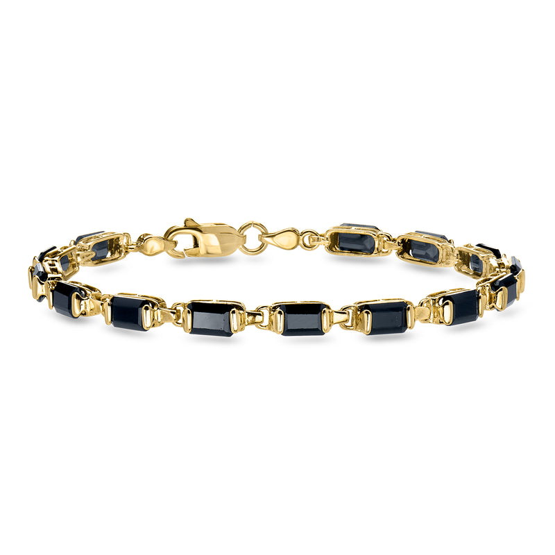 Yellow gold link bracelet with dark blue rectangular gemstone accents and box clasp