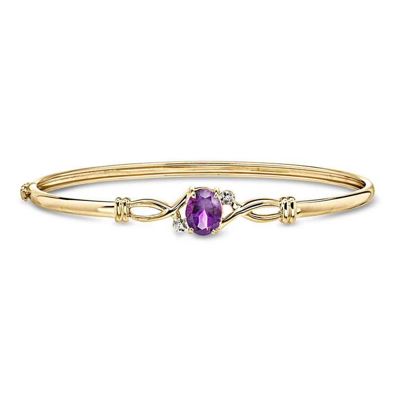 10kt yellow gold amethyst bangle bracelet with diamond accents and oval purple center stone