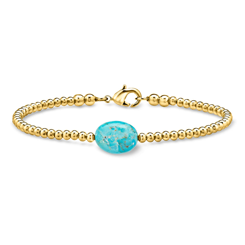 Gold-plated bead bracelet with simulated turquoise oval centerpiece and toggle clasp