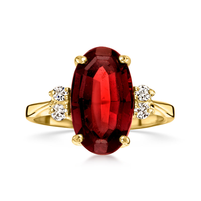 Oval garnet ring in 14kt yellow gold with diamond accents and red gemstone