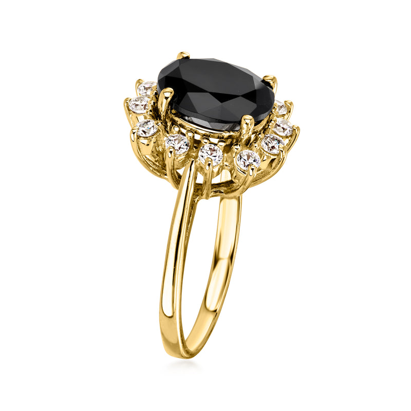 14kt yellow gold ring with raised black oval center and side clusters of clear stones