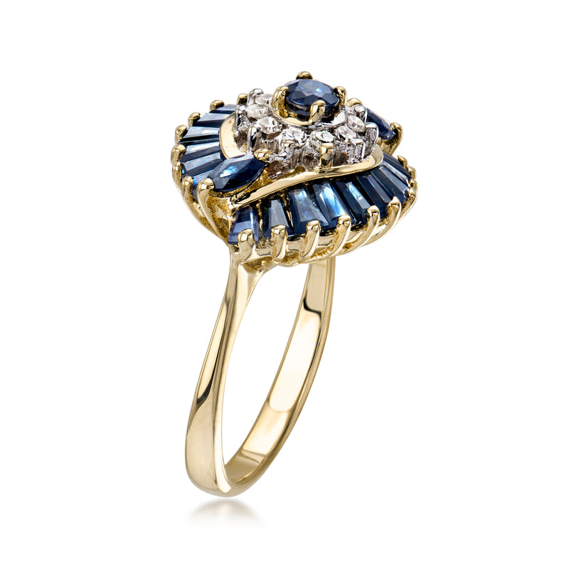 Vintage sapphire and diamond swirl ring, blue center stone with round diamond halo in yellow gold