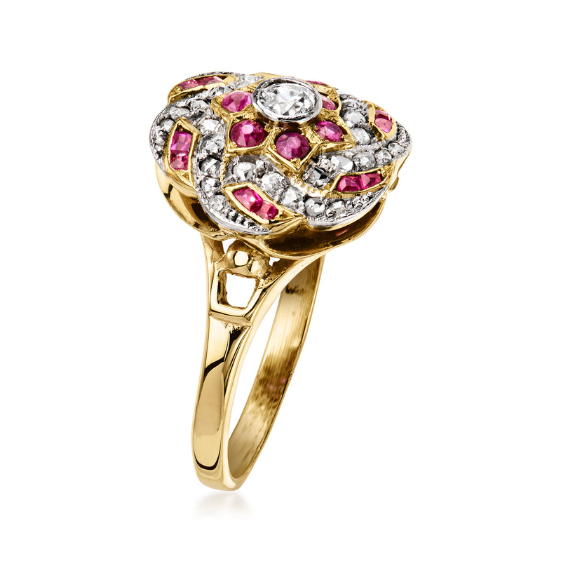 14kt yellow gold floral ring with oval diamond center and ruby accents