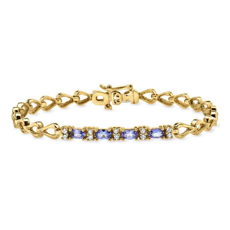 14kt yellow gold bracelet with blue tanzanite row and small diamond accents